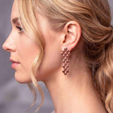 SG Liquid Metal E3 - SS / Rose Titanium (Stainless Steel Earring) by Sergio Gutierrez